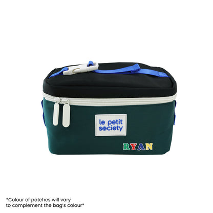 A black and green thermal lunch bag personalised with name patches.