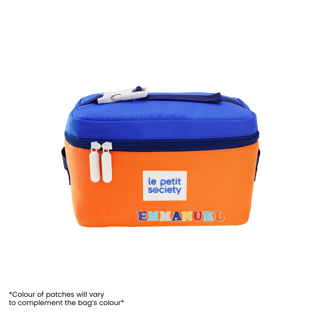 A blue and orange thermal lunch bag personalised with name patches.