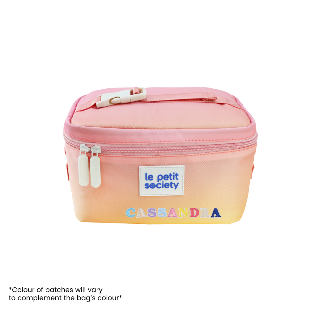 A thermal lunch bag with personalised name patches.
