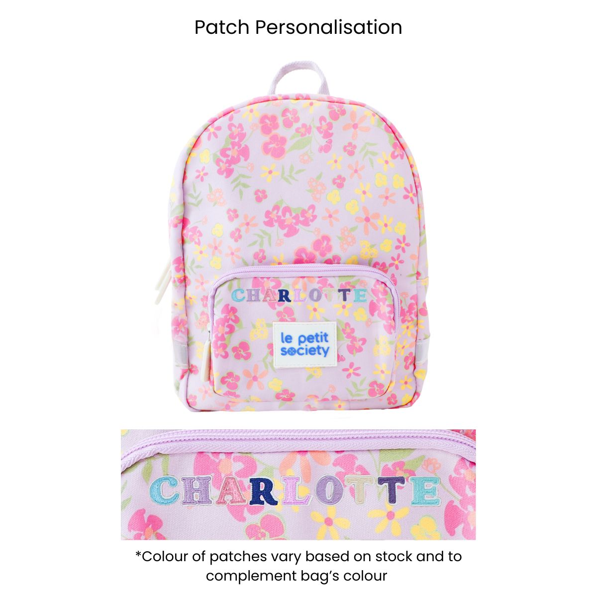 A purple preschool bag with a pink and yellow floral print and personalised name patches.