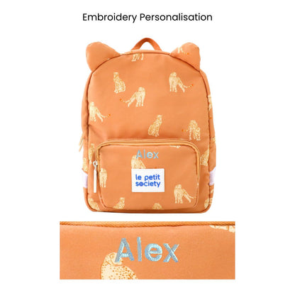 An orange preschool bag with a leopard print and personalised name embroidery.