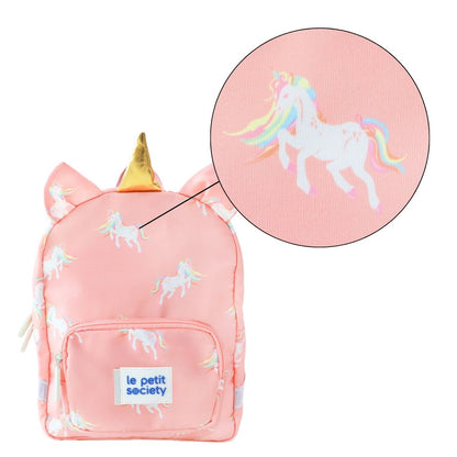 A close-up of the unicorn print of a pink preschool bag.