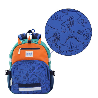 A close-up of the dinosaur print of the single pocket school bag in dino.