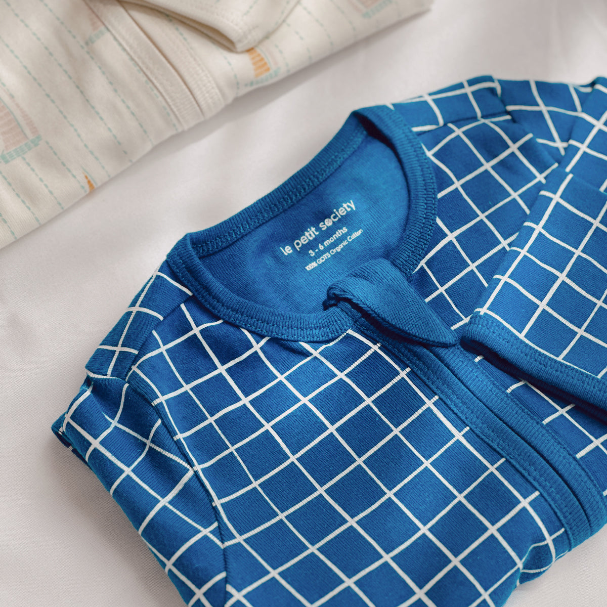 Baby Organic Zip Sleepsuit in Grid Print by Le Petit Society — image 10