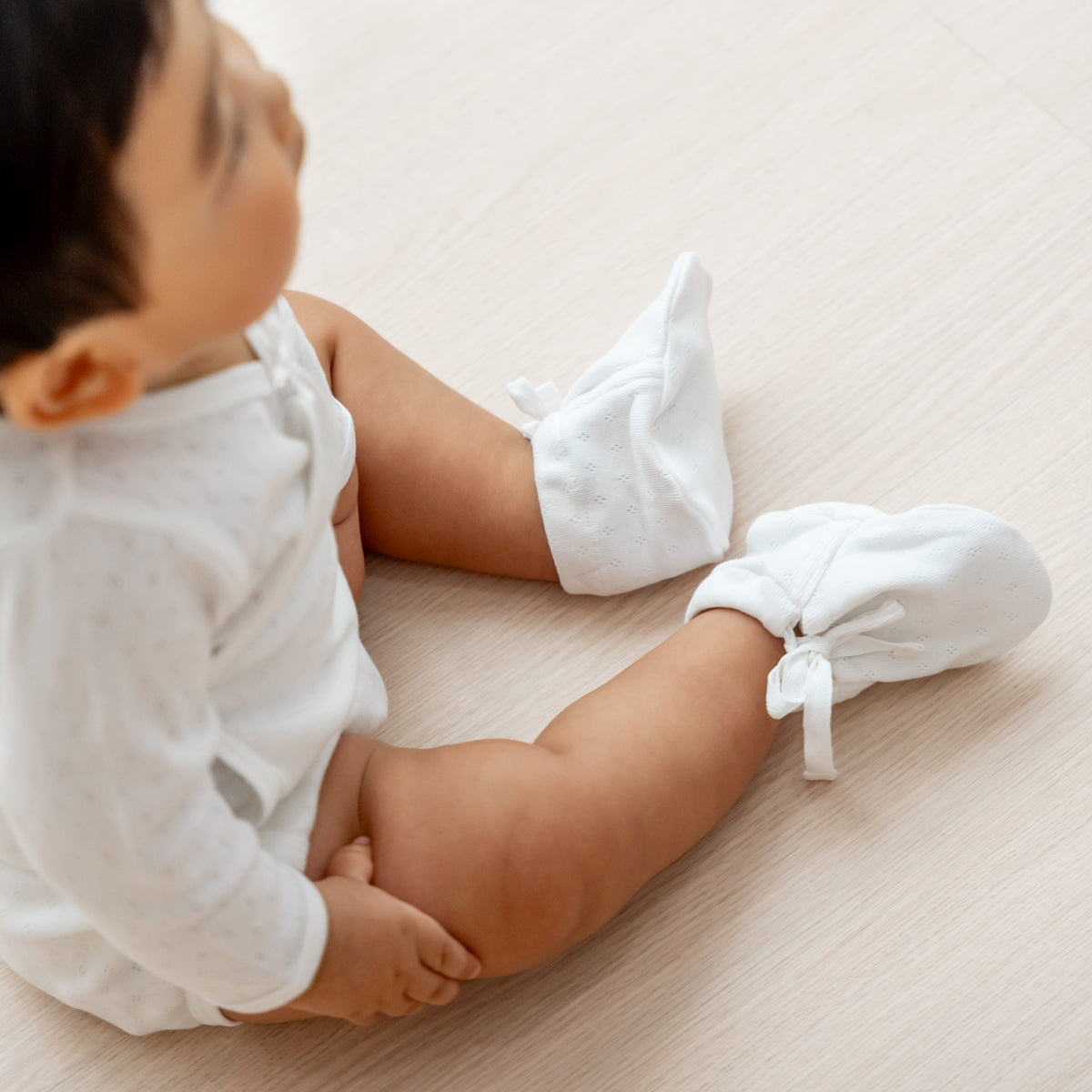 Organic Baby Booties in White by Le Petit Society — image 5