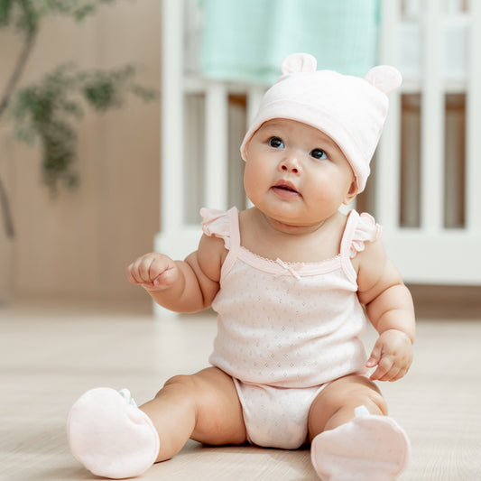 Organic Baby Ruffle Strap Romper in Pink by Le Petit Society