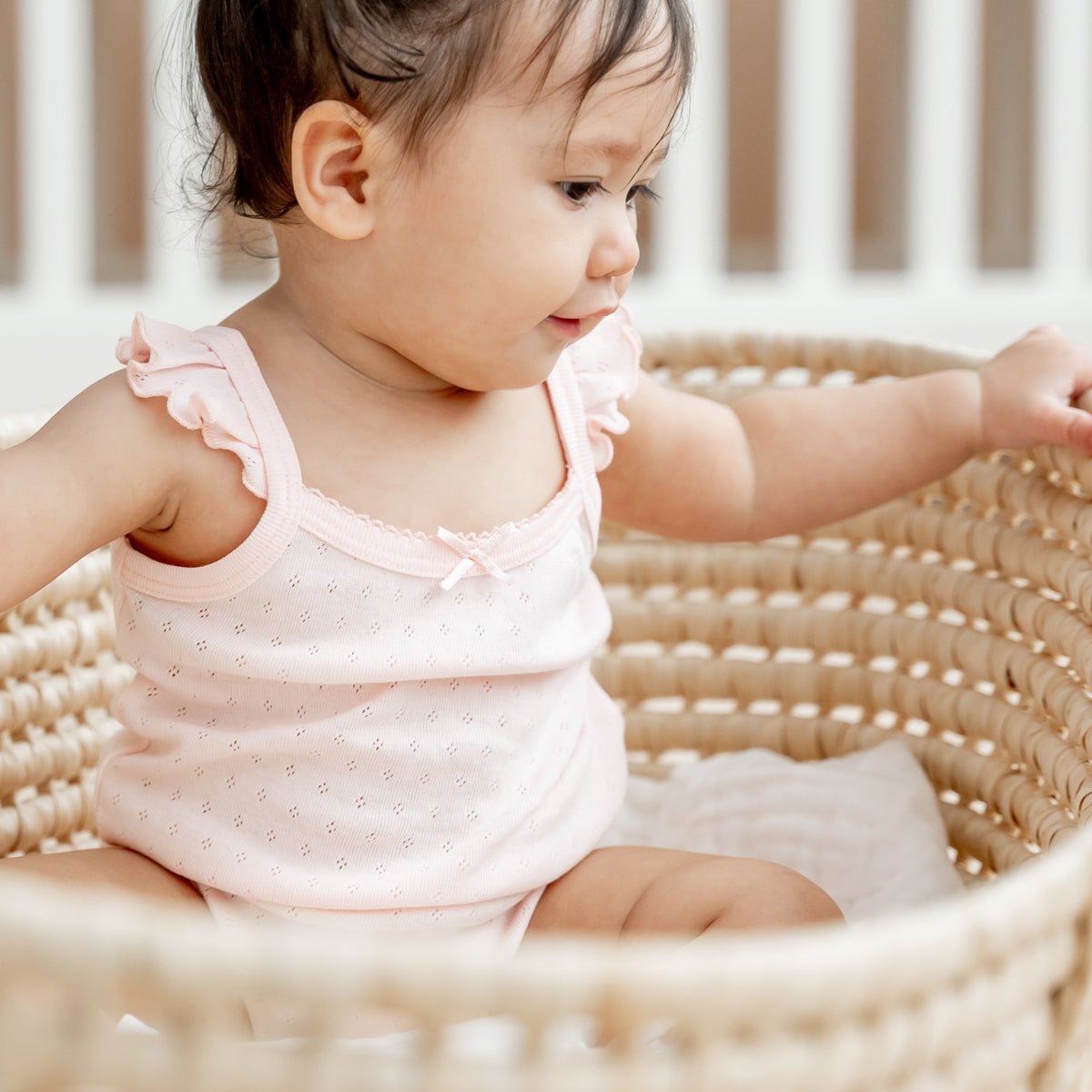 Organic Baby Ruffle Strap Romper in Pink by Le Petit Society — image 5
