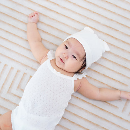 Organic Baby Ruffle Strap Romper in White by Le Petit Society — image 9