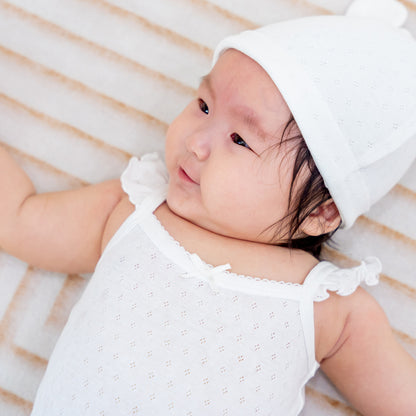 Organic Baby Ruffle Strap Romper in White by Le Petit Society — image 4