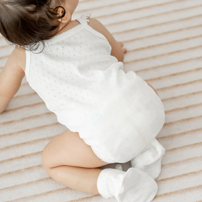 Organic Baby Ruffle Strap Romper in White by Le Petit Society — image 3