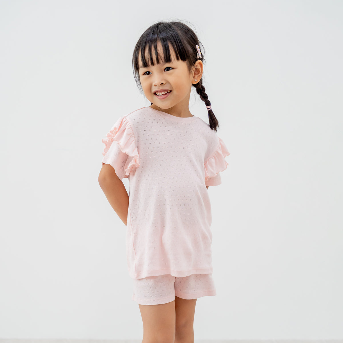 Organic Kids Ruffle Short Sleeves PJ Set in Pink by Le Petit Society — image 2