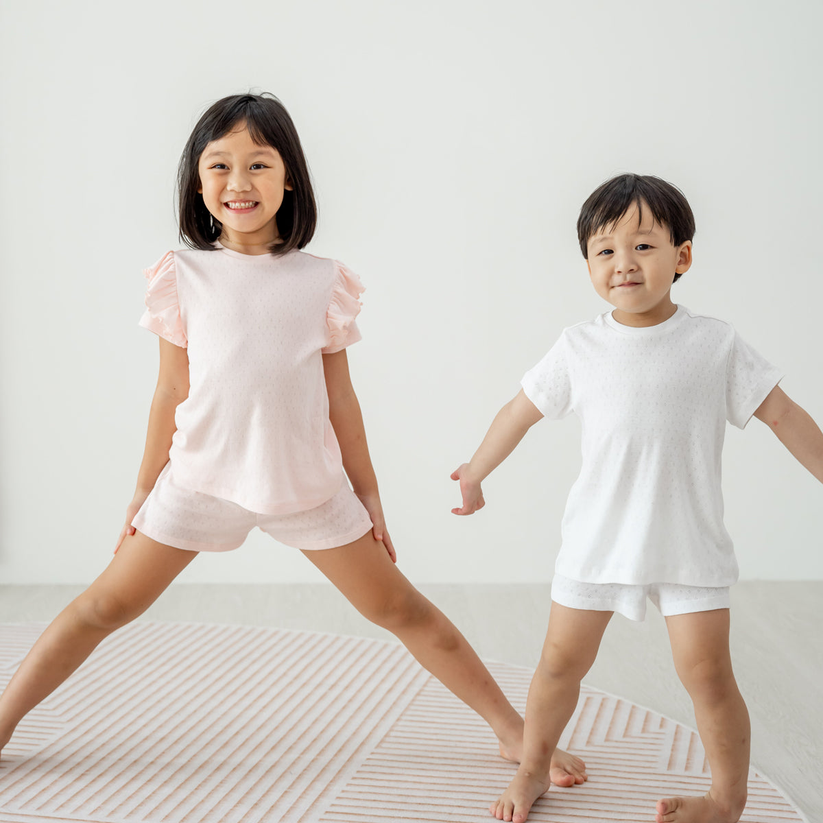 Organic Kids Ruffle Short Sleeves PJ Set in Pink by Le Petit Society — image 5