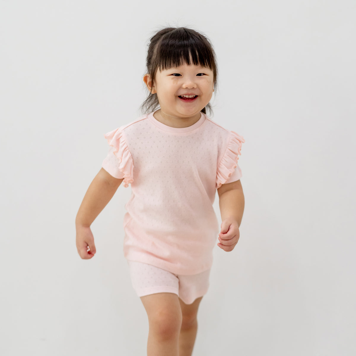 Organic Kids Ruffle Short Sleeves PJ Set in Pink by Le Petit Society — image 6