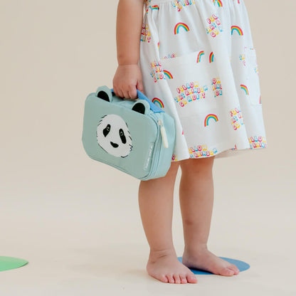 A toddler carrying a mint blue pencil case and pouch with a panda print and a pair of ears.