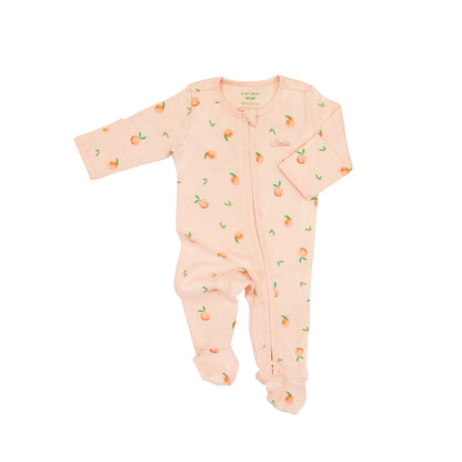 An organic baby zip sleepsuit from Le Petit Society. It is coral pink in colour, with a print of peaches and foldable mittens and footies.