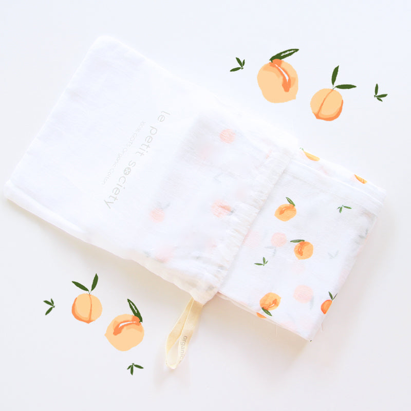 Baby Organic Swaddle in Peach by Le Petit Society — image 2