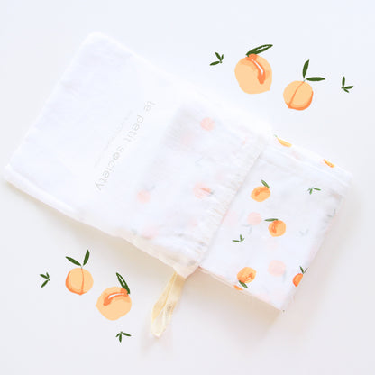 Baby Organic Swaddle in Peach by Le Petit Society — image 2