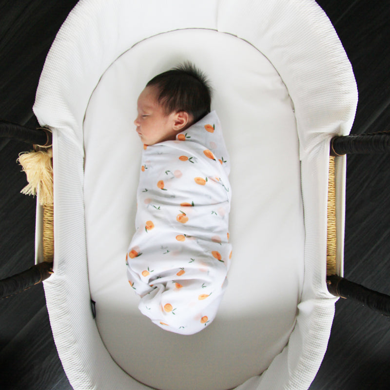 Baby Organic Swaddle in Peach by Le Petit Society — image 3