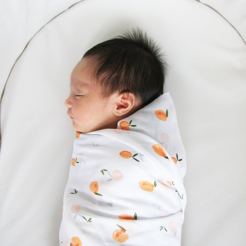 Baby Organic Swaddle in Peach by Le Petit Society — image 4