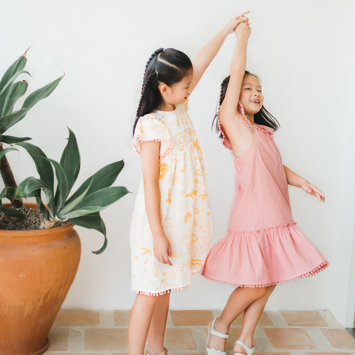 Resort Series - Girls Ruffled Sundress in Pink by Le Petit Society — image 7