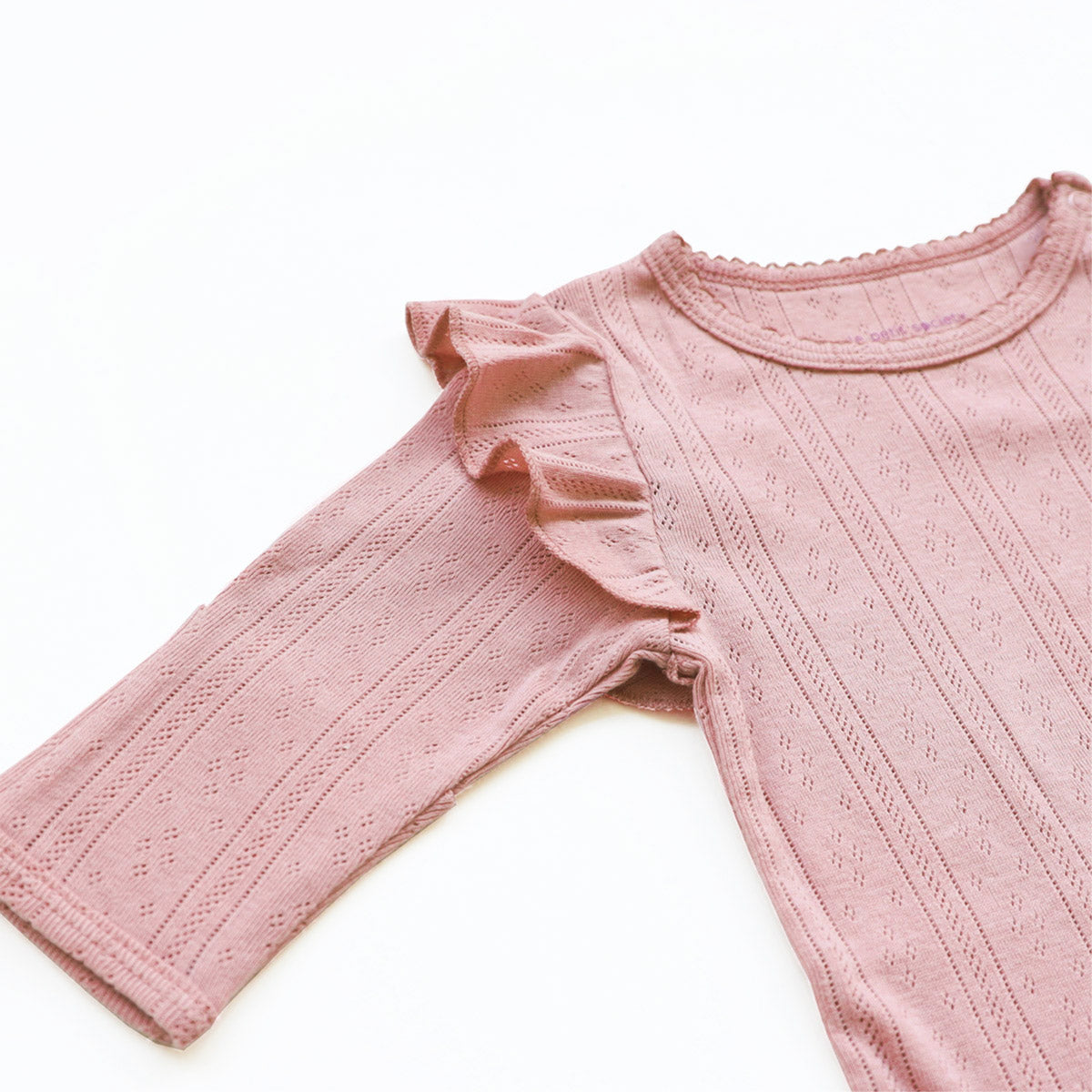 Baby Girl Long Sleeve Ruffle Romper in Plum Pointelle Cotton by Le Petit Society — image 7