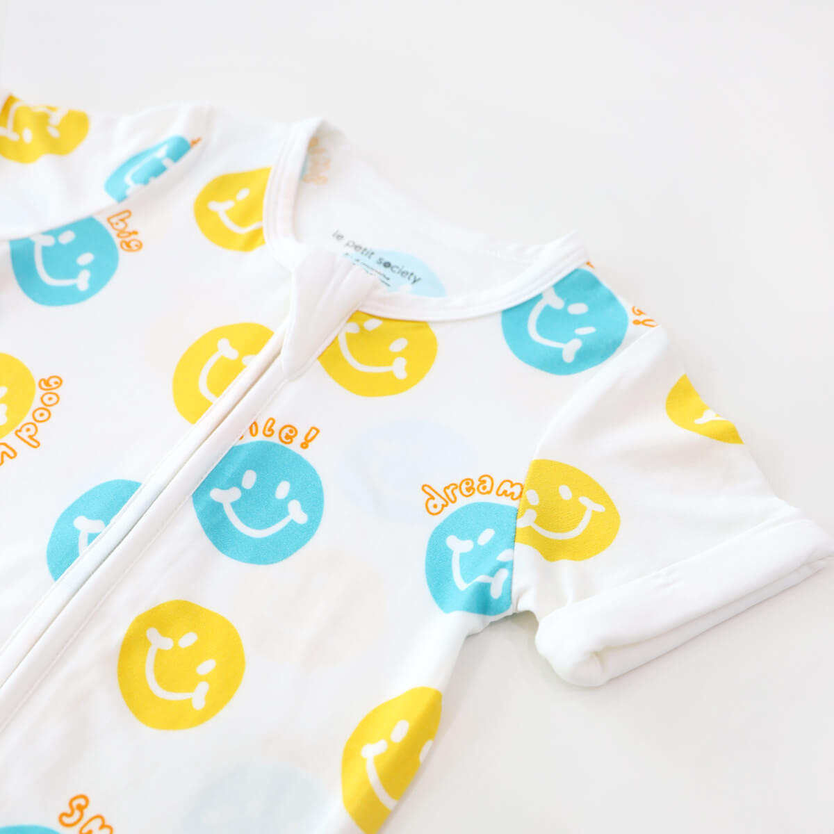 Baby Bamboo Short Sleeves Sleepsuit in Smiley Print by Le Petit Society — image 2