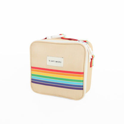 A beige-coloured thermal lunch bag with a rainbow print from Le Petit Society.