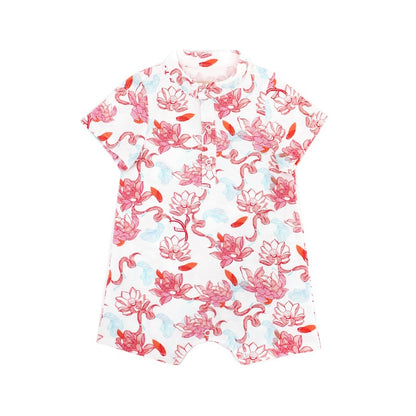 Baby romper from the Le Petit Society x Sheila Sim CNY 2026 lotus collection, featuring an allover lotus print in soft corals and sky blue. The lightweight fabric and mini mandarin collar give it a festive cheongsam-inspired look, perfect for little ones 