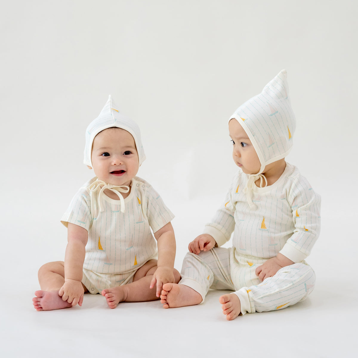 Baby Organic Short Sleeve Romper in Sail Boat Print by Le Petit Society — image 4