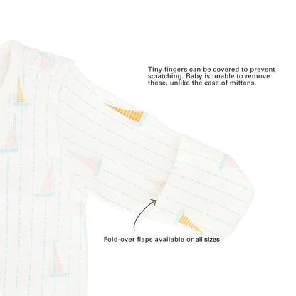 An infographic showing the mittens of an organic baby zip sleepsuit, which come with fold over flaps to cover a baby's hands and keep them warm.
