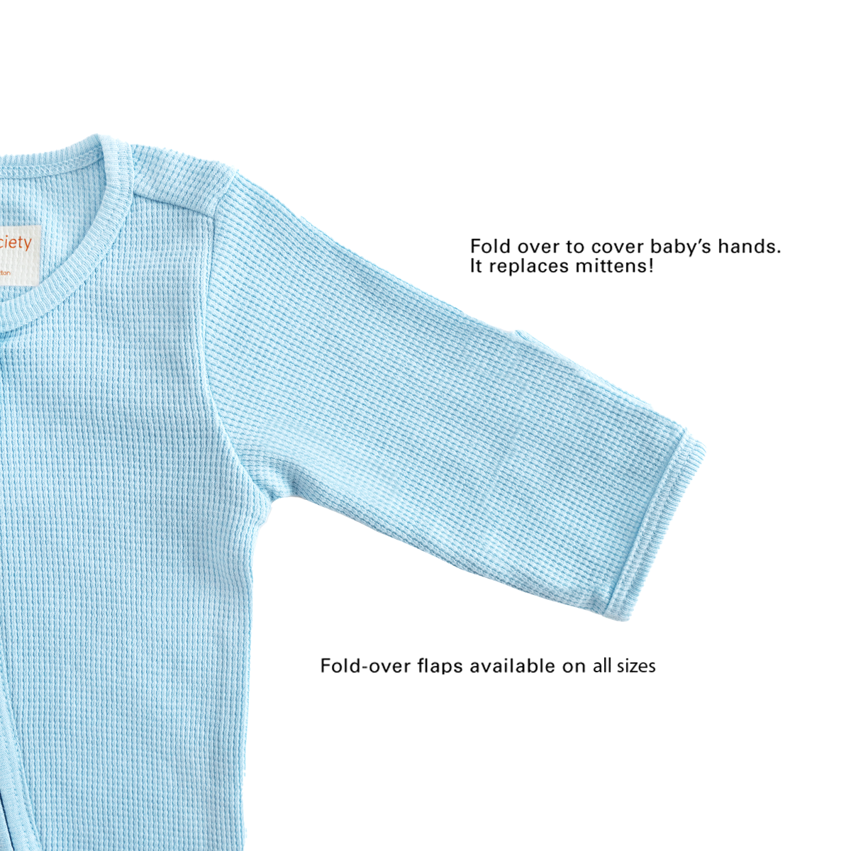 A baby organic zip sleepsuit in blue by Le Petit Society, with fold over flaps at the sleeves to cover a baby's hands, acting as a substitute for mittens.
