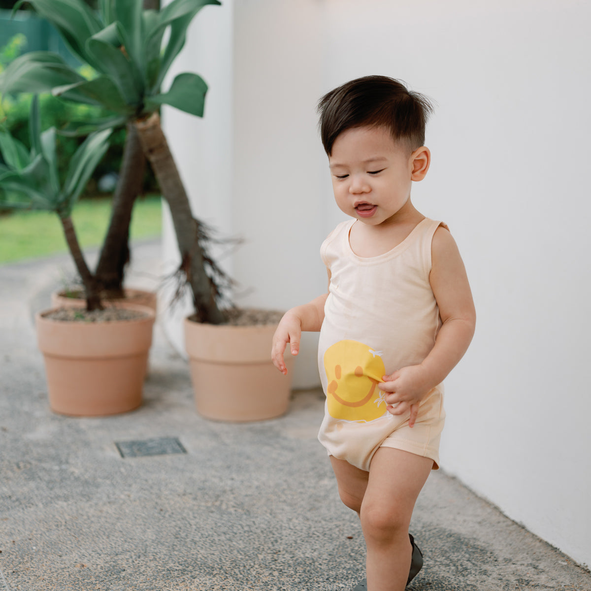 Resort Series in Baby Smiley Romper by Le Petit Society — image 3