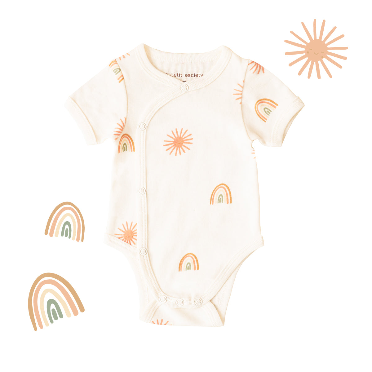 A baby kimono romper by Le Petit Society, featuring a print of sun and rainbows over a cream base. 
