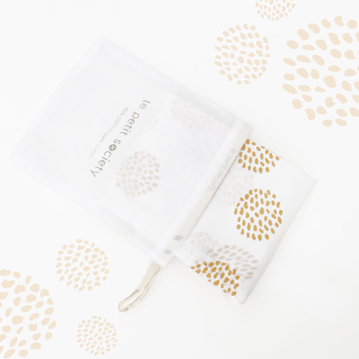 Baby Organic Swaddle in Dandelion Print by Le Petit Society — image 2