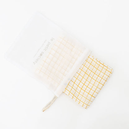 Baby Organic Swaddle in Yellow Grid by Le Petit Society