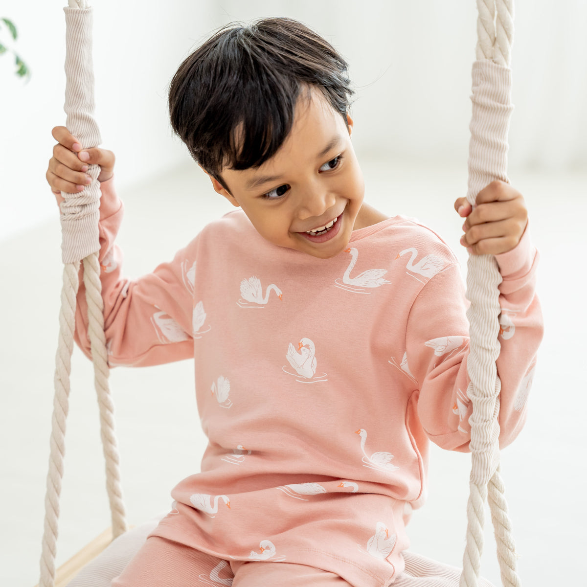 Kids Long Sleeve Organic Pyjamas Set in Swan Print by Le Petit Society — image 4