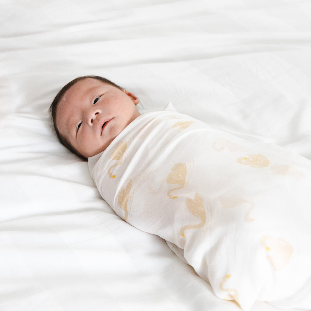 Baby Organic Swaddle in Swan Print by Le Petit Society — image 7