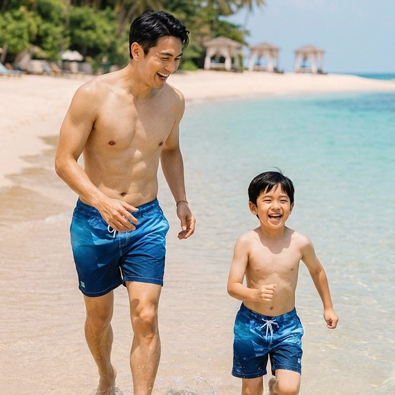 Boys Swim Shorts in Midnight Ocean Gradient by Le Petit Society — image 2