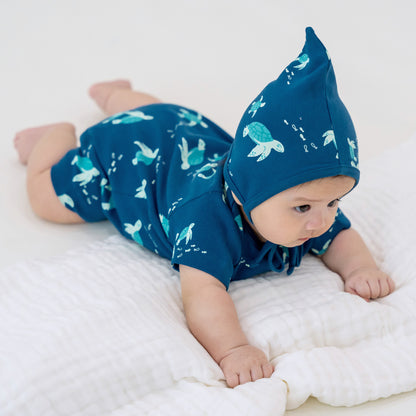 Baby Organic Short Sleeve Romper in Turtle Print by Le Petit Society — image 2