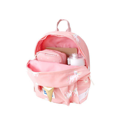 Water bottle, pencil case and a notebook being stored in a pink unicorn print school bag.