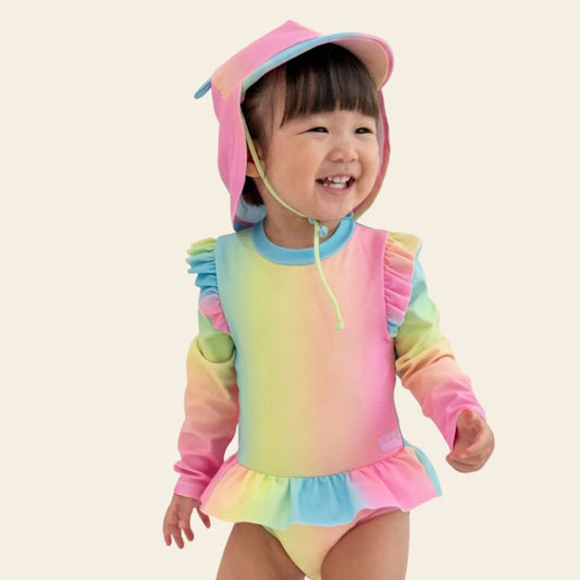 Baby Ruffle Swimsuit in Rainbow Gradient by Le Petit Society