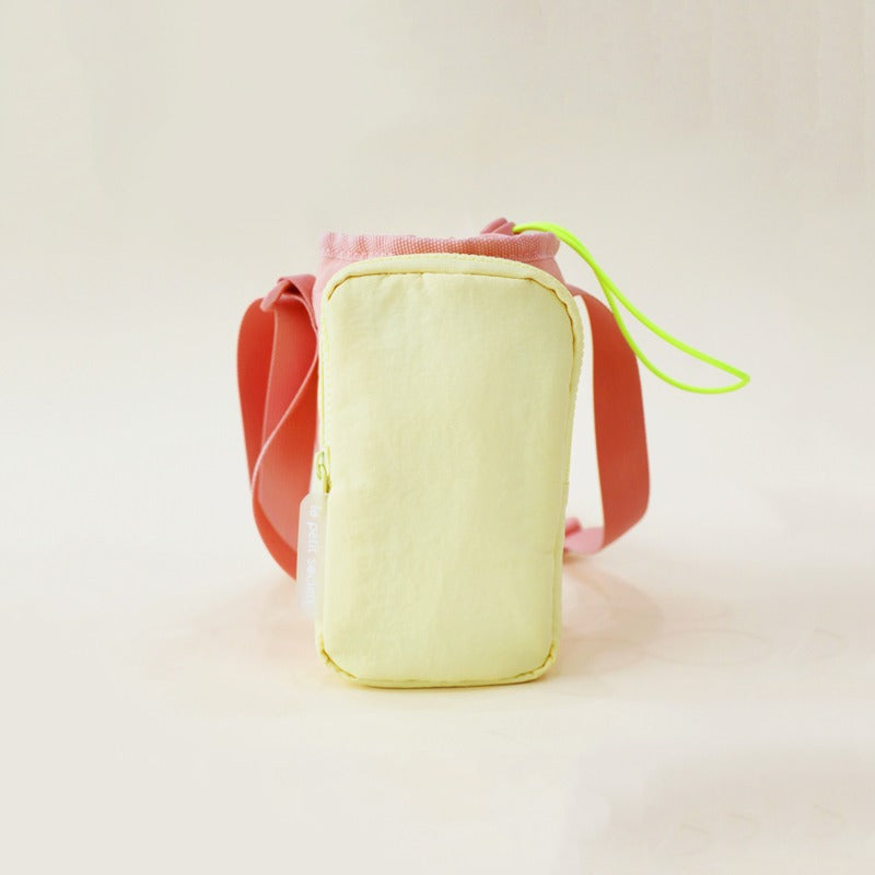 Kids water bottle sling bag in peach and yellow with adjustable strap and front pocket