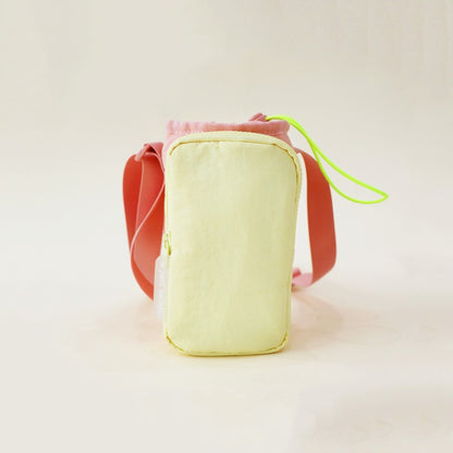 Kids water bottle sling bag in peach and yellow with adjustable strap and front pocket