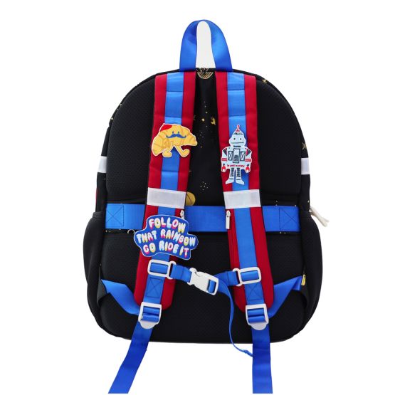 The shoulder straps of a Le Petit Society school bag personalised with velcro patches.