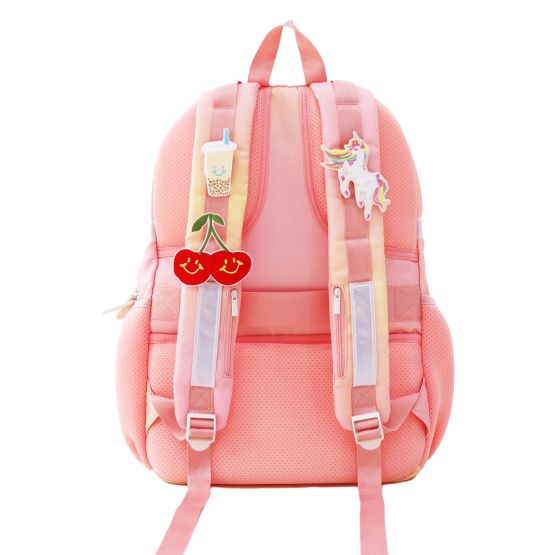 The shoulder straps of a Le Petit Society school customised with velcro patches.