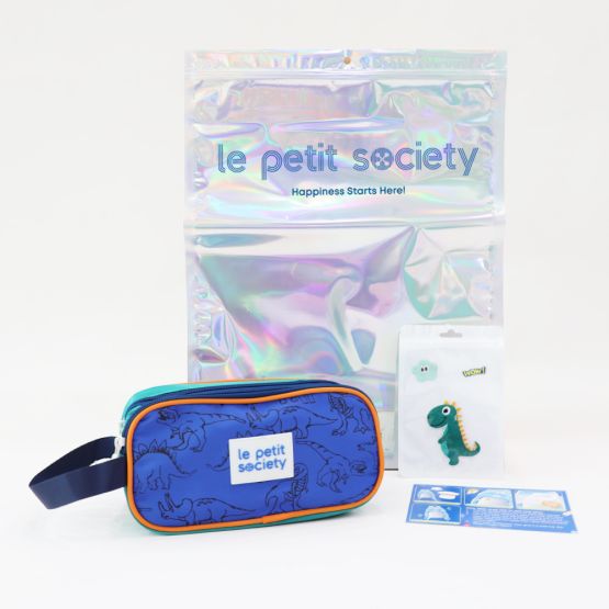 Le Petit Society's dinosaur-themed customisable party pack, with a blue and orange pencil case and sticker patches for personalisation.