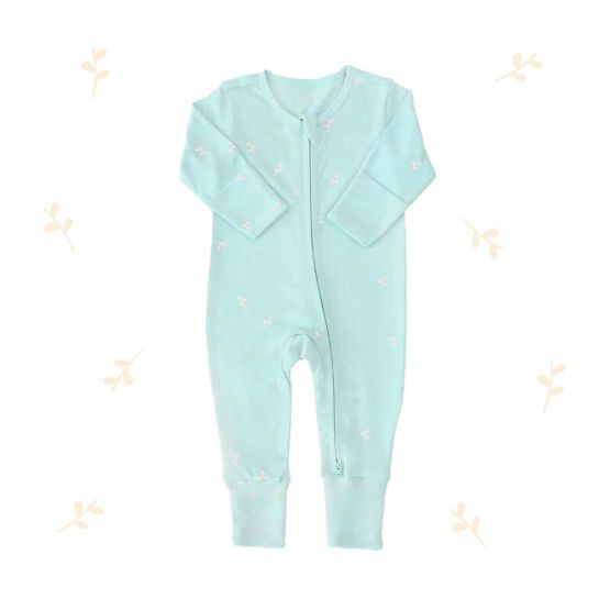 An organic baby zip sleepsuit from Le Petit Society. It is mint blue in colour, with a print of leaves and foldable mittens and footies.