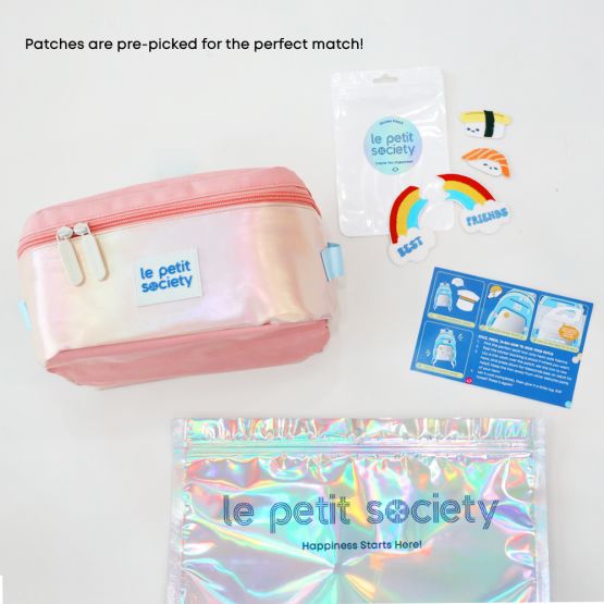 Le Petit Society's customisable party pack for best-friends, with an iridescent pink thermal lunch bag and sticker patches for personalisation.