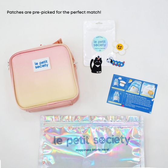 Le Petit Society's customisable party pack for pet lovers, with a pink and yellow thermal lunch bag and a pet-themed sticker patches.