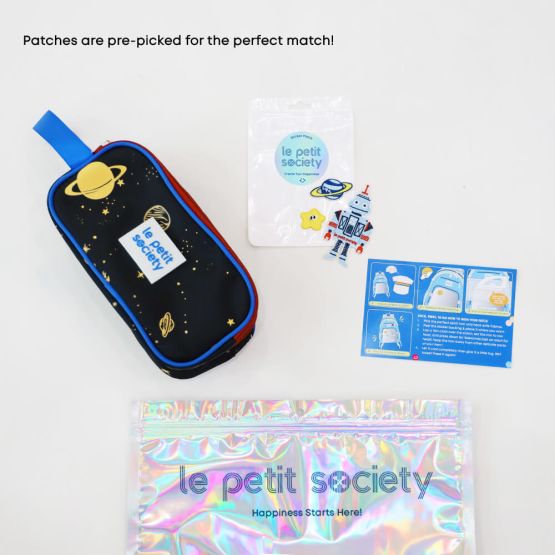 A black and red pencil case in planets print and space-themed sticker patches for personalisation from Le Petit Society's customisable party pack.
